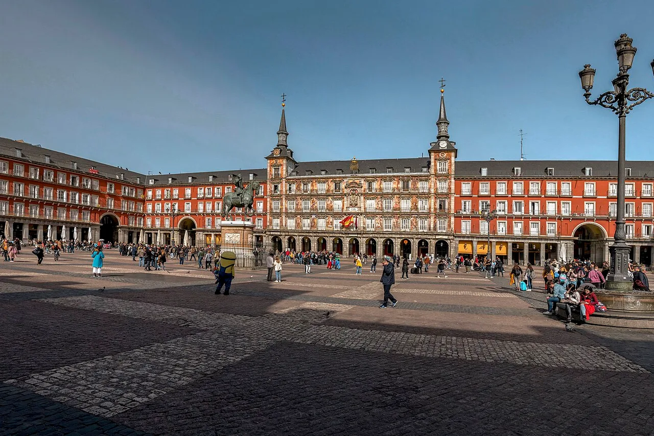 Plaza Mayor in Madrid, its equestrian statue and arcades