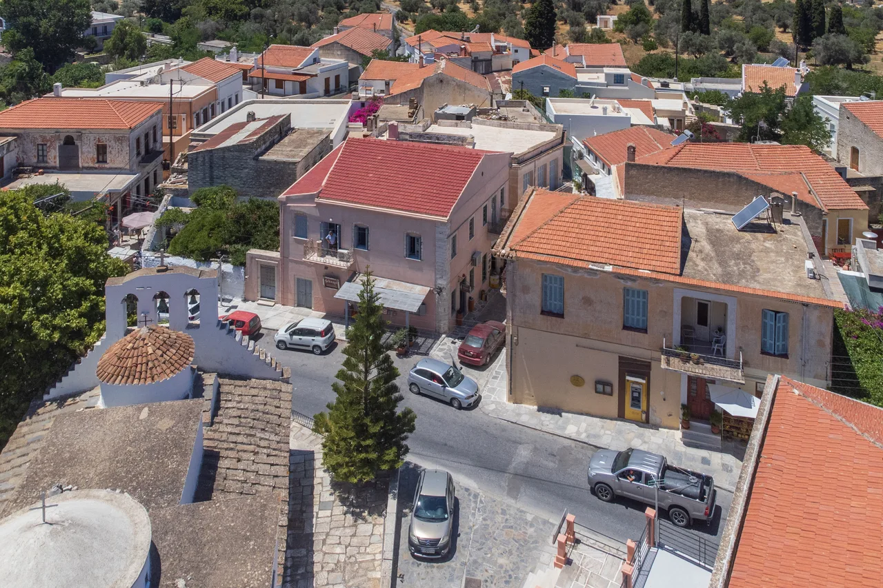 The village of Halki inland on Naxos, tiled roofs and olive groves