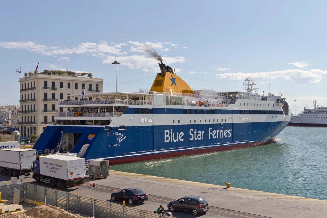 A large Blue Star ferry berthed at Piraeus with lorries loading
