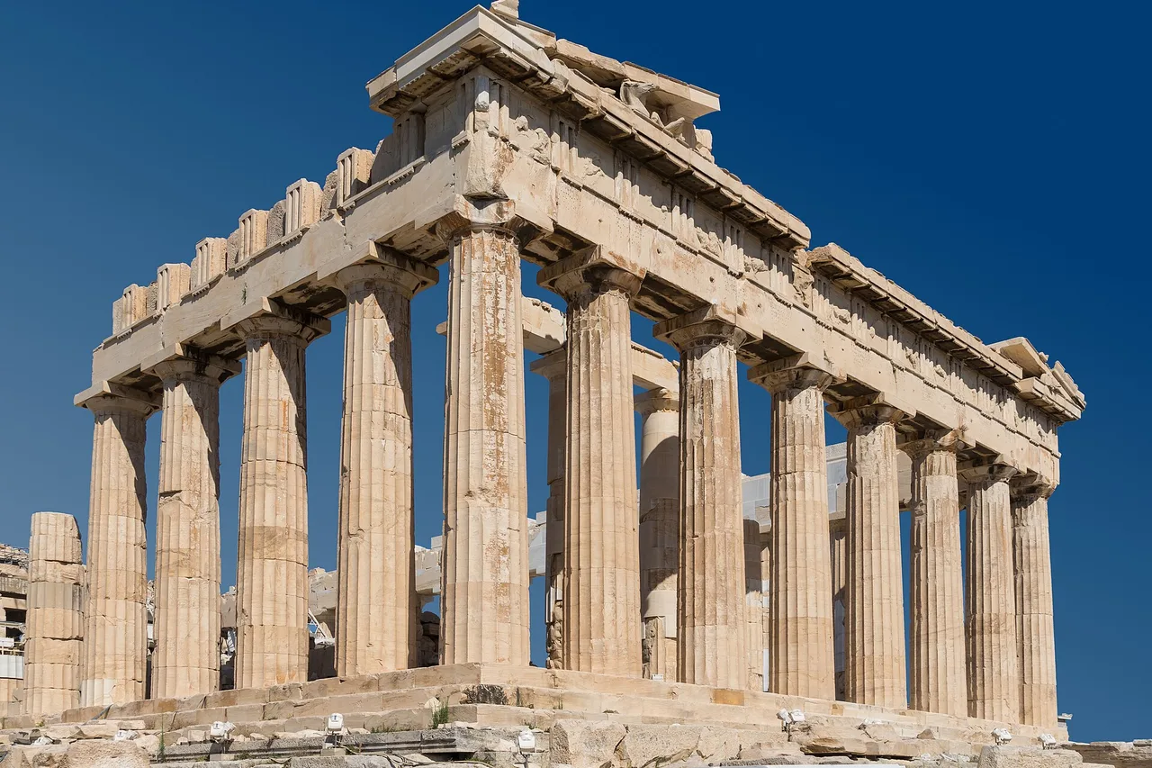 The east colonnade of the Parthenon on the Acropolis of Athens, under a deep blue sky