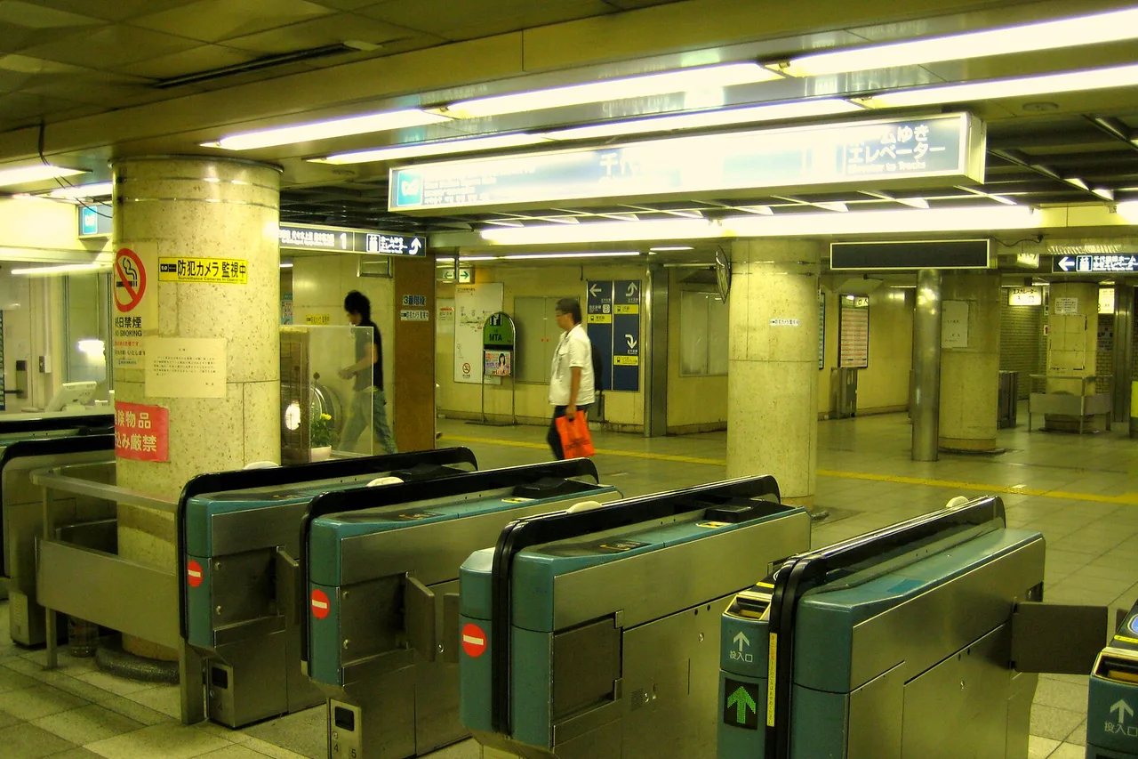 A row of Tokyo metro ticket gates at Kita-Senju station