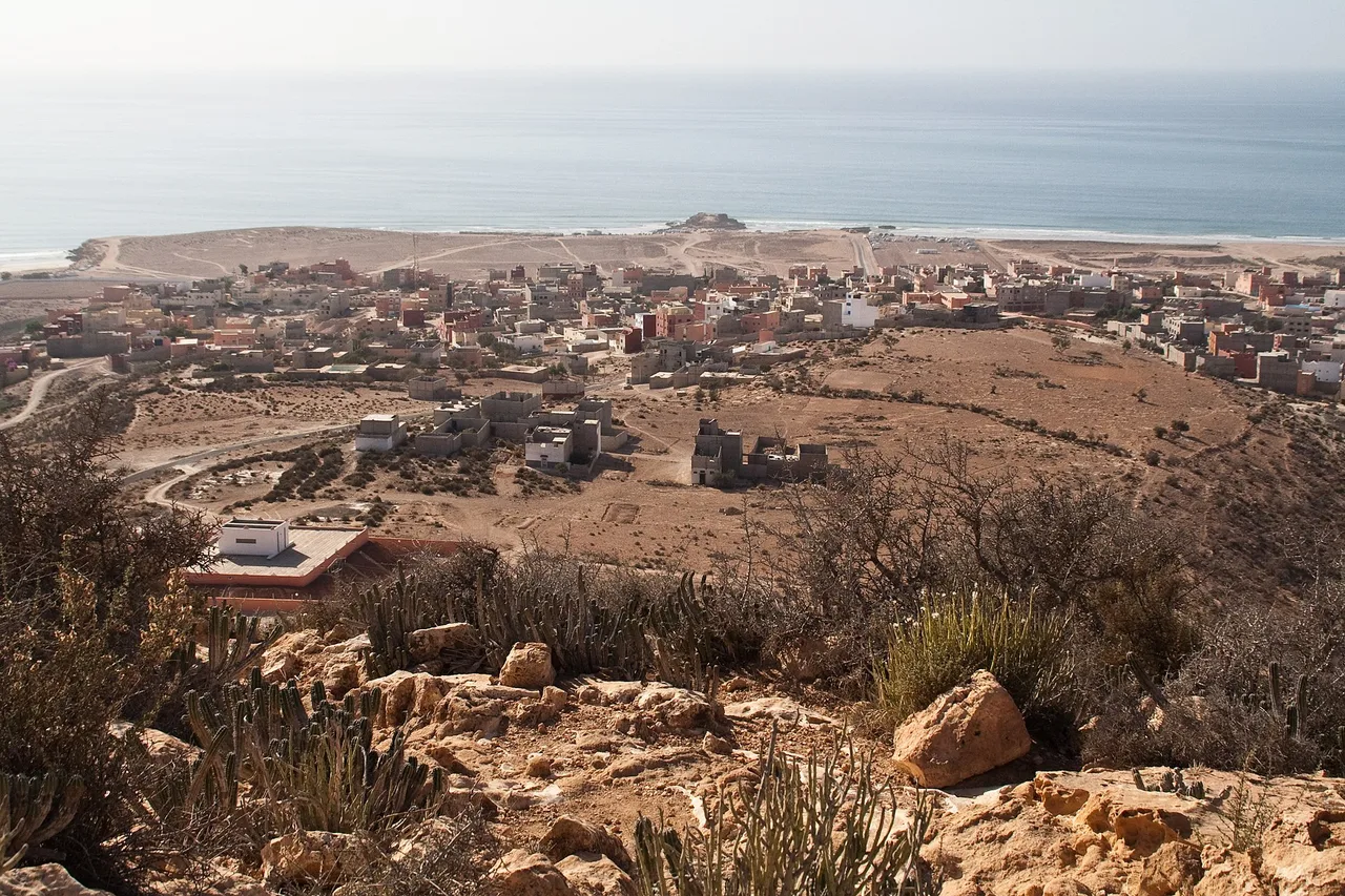 The village of Tamraght spread across its hillside, between the valley and the Atlantic coast