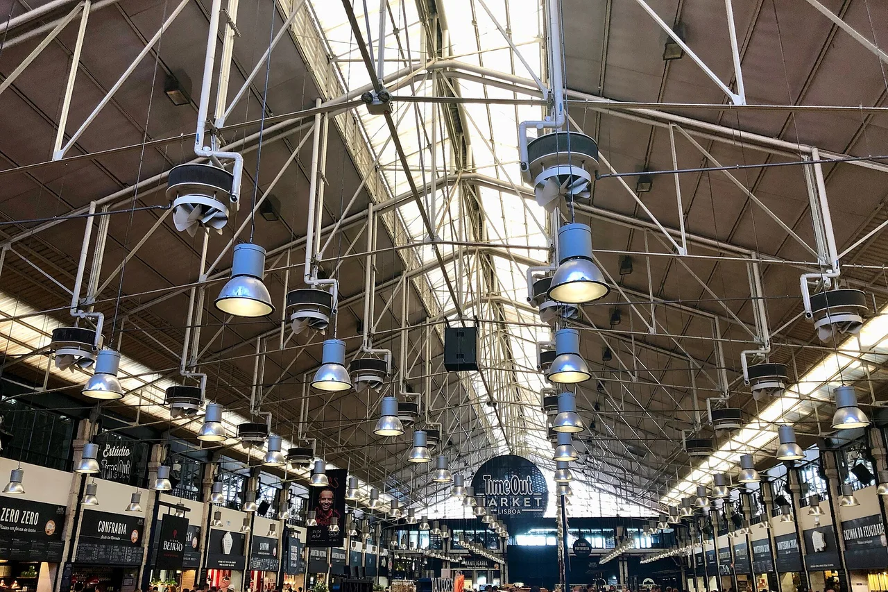 Inside Lisbon’s Time Out Market, its long communal tables and food counters