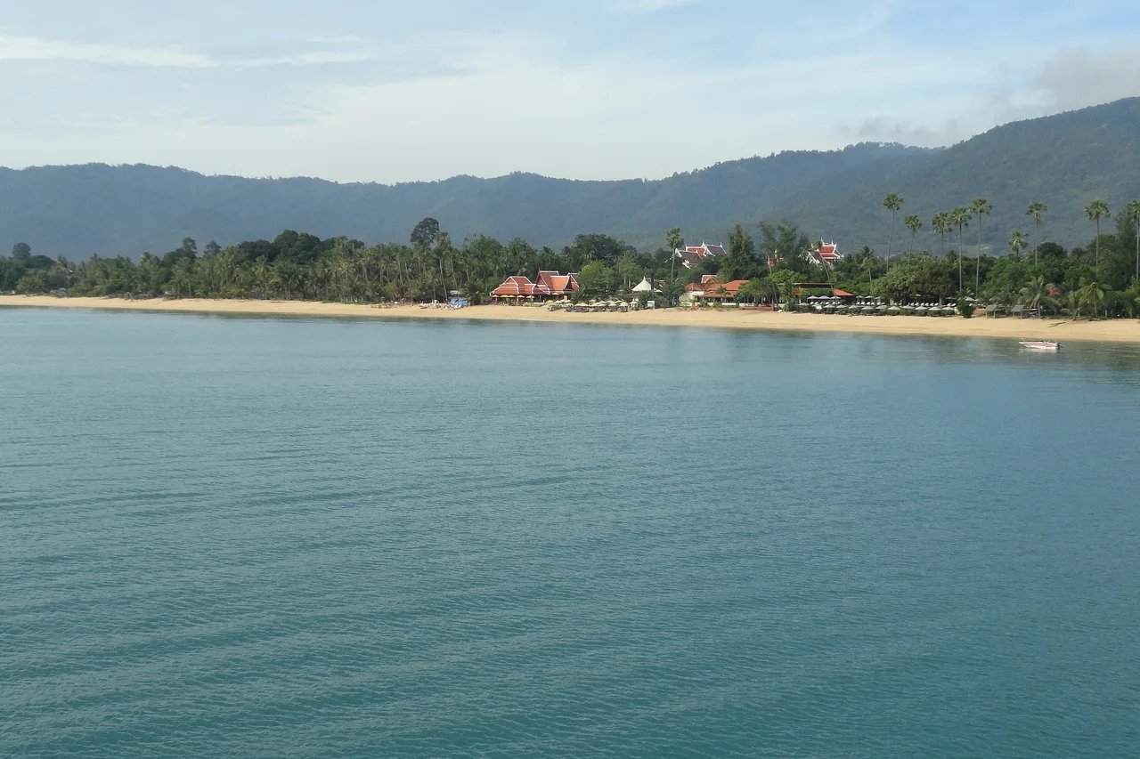 View from the deck of a ferry approaching a beach in the Gulf of Thailand